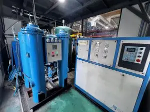 Gas-assisted injection molding machine setup.