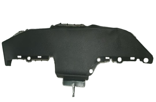 Injection-molded leather grain automotive component.