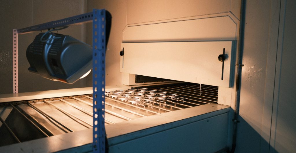 Injection molding and downstream manufacturing in coordinated production.